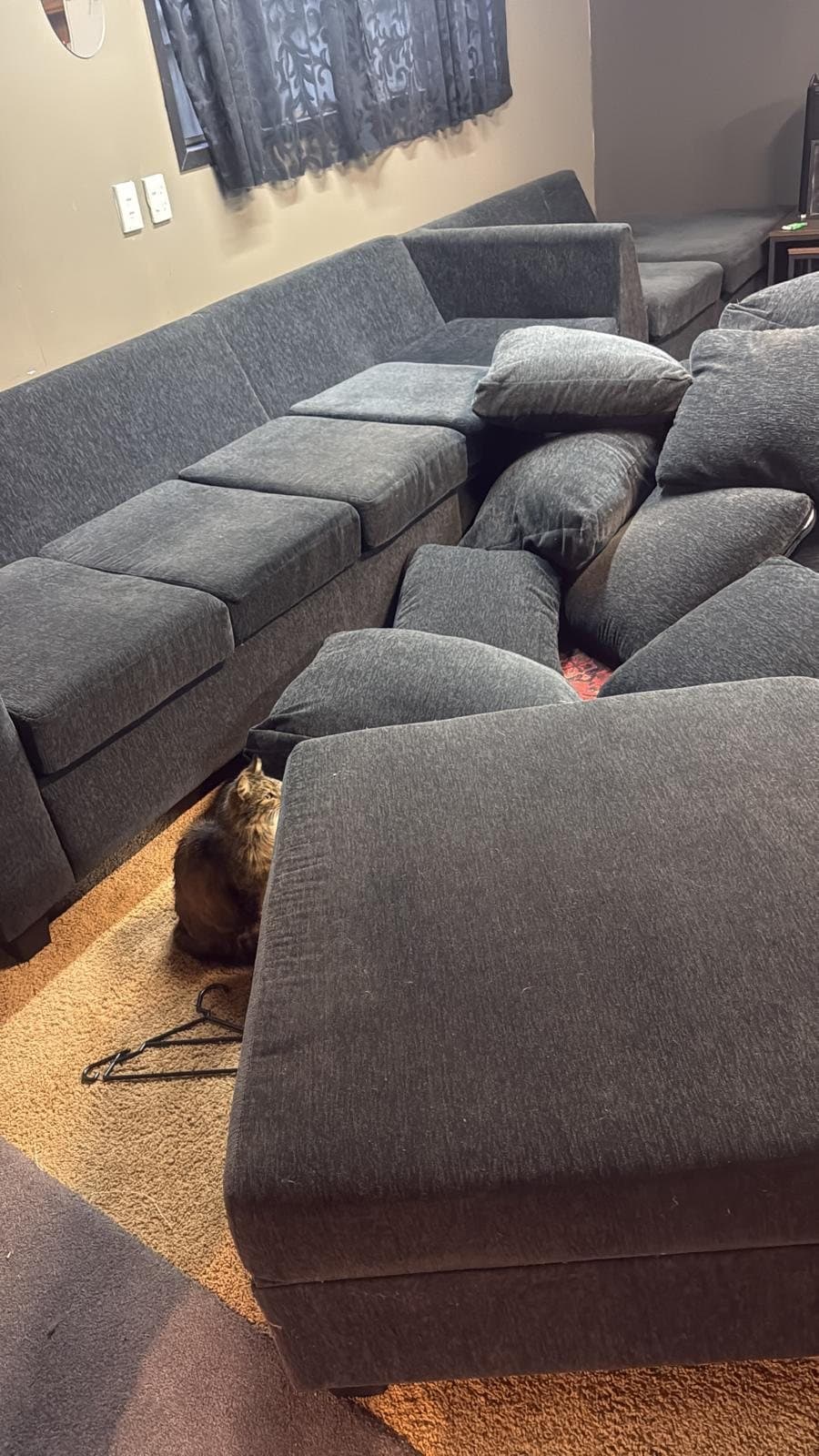 Sectional sofa being reassembled at the new home