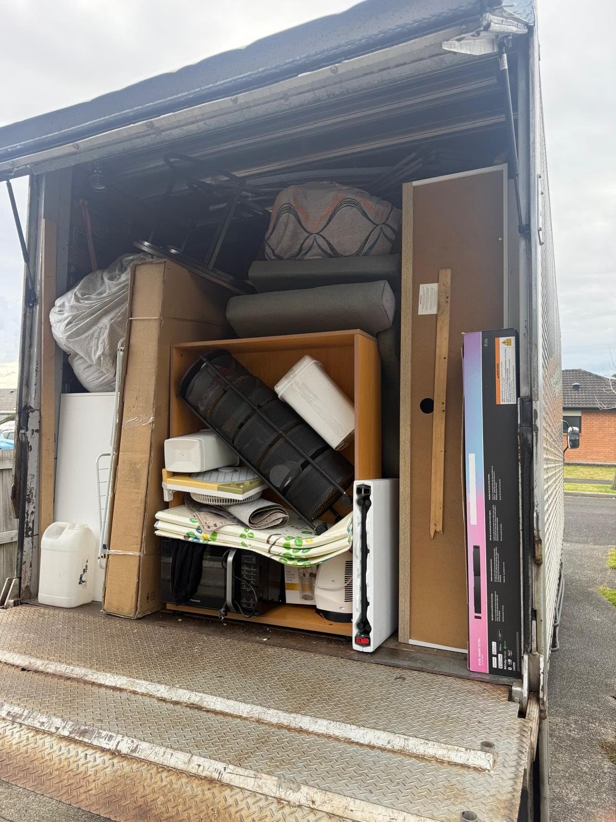 Truck packed floor to ceiling, every gap used safely